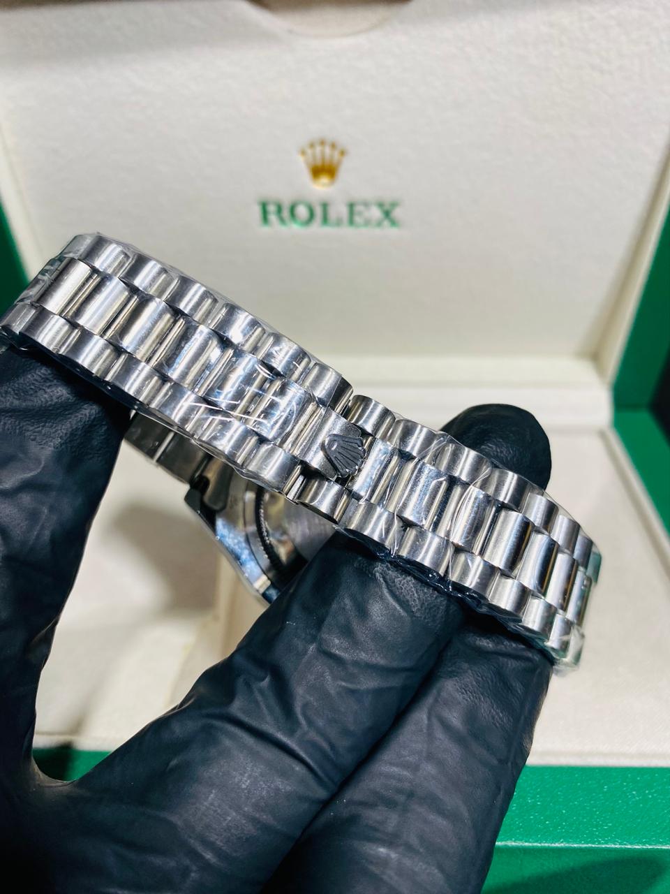 rolex silver with blue dial