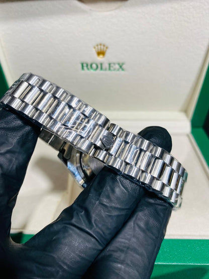 rolex silver with blue dial